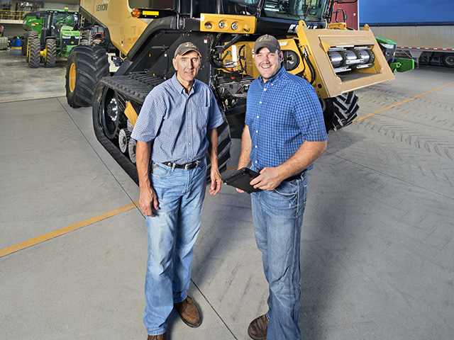 Jim Sladek (left) focuses on operational planning, risk management, finance and grain marketing. Son, Rob (right), is creating an ERP system